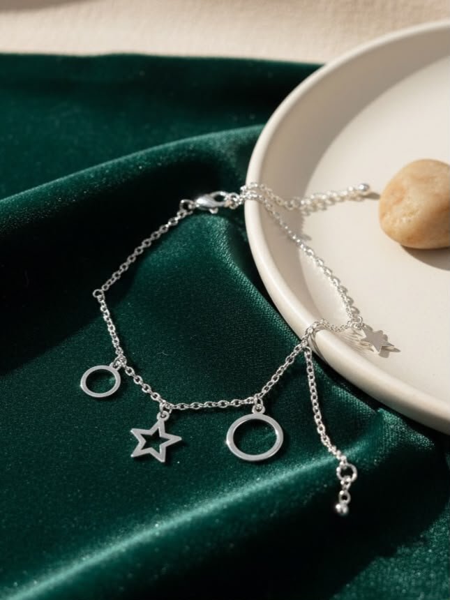 PULSERA ESTRELLAS Y CÍRCULOS ACERO BLANCO