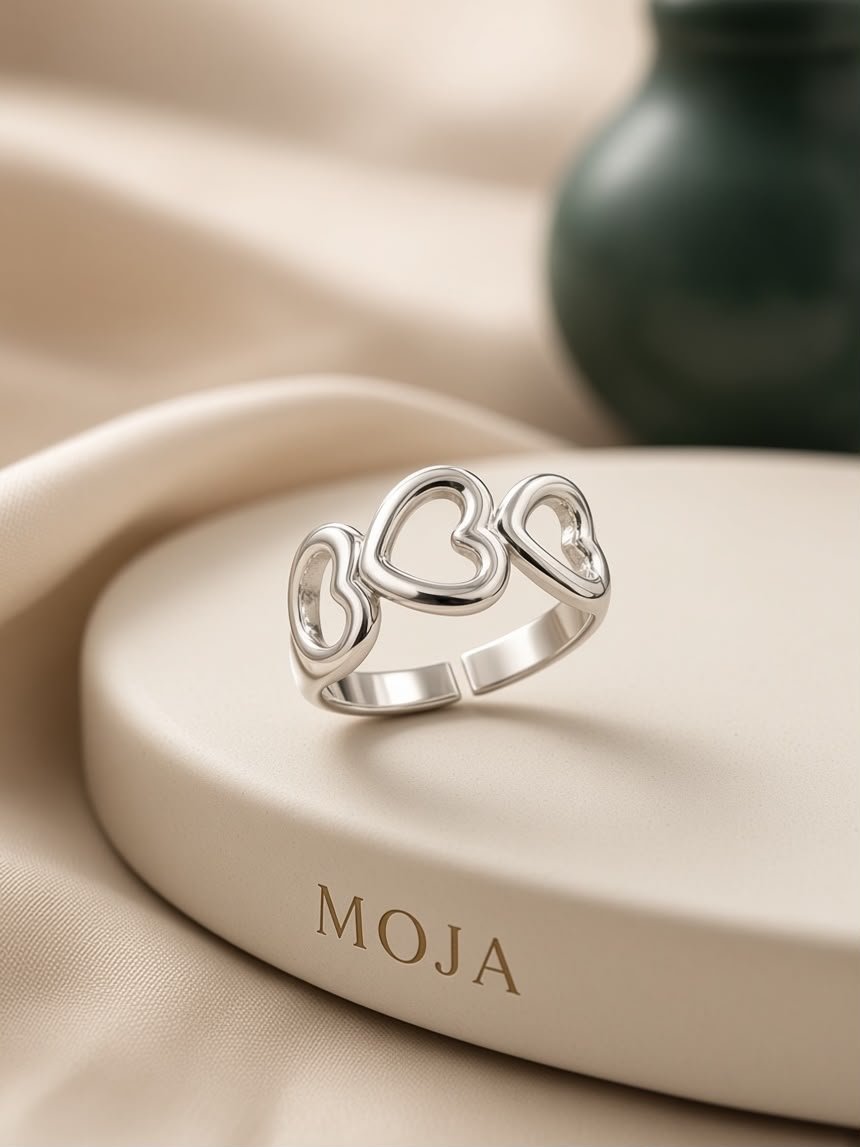 ANILLO REGULABLE 3 CORAZONES ACERO BLANCO