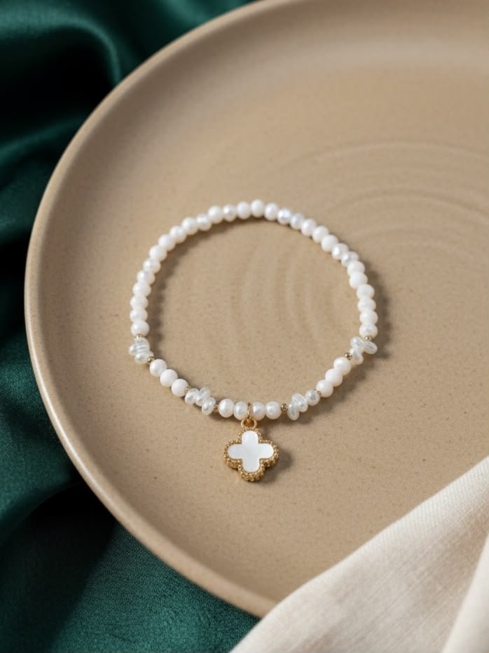 PULSERA ROSA Y DIJE TRÉBOL BLANCO CANUTILLOS