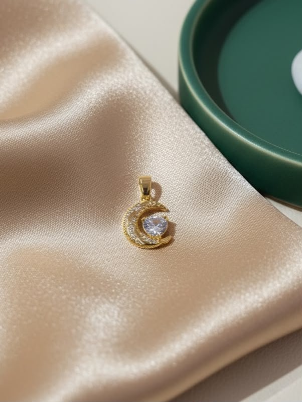 DIJE LUNA Y CORAZONCITO ACERO DORADO