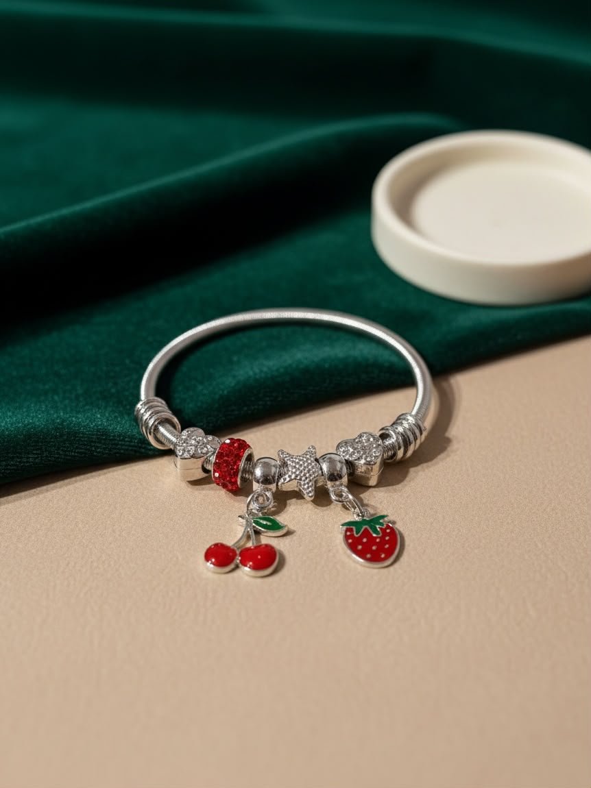 PULSERA CON CHARMS CEREZAS Y FRUTILLA FANTASÍA